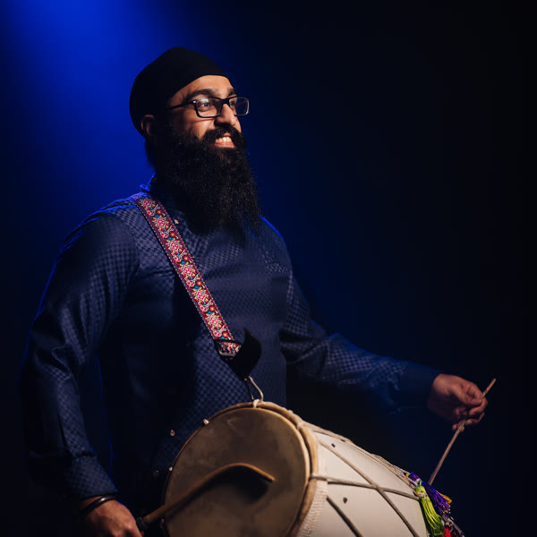 Dholi Preet playing dhol for DJ Jazz Entertainment